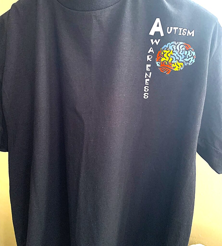 autism awareness badge tee